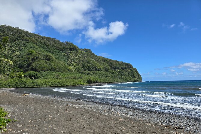 Private Road to Hana Tour with Pickup - Ho‘okipa Beach Park at sunset: surfers plus sea turtles
