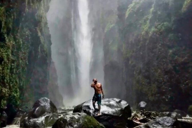 Road to Hana Maui Tours - Honokalani black sand and Kaihalulu Red Sand Beach: two shores, two moods